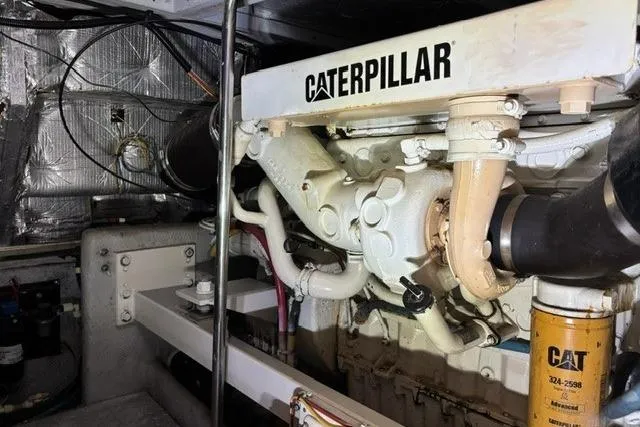 Slide: The Image of Engine room of 2002 Silverton 43 Motor Yacht with Caterpillar engine components. - 21