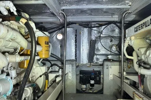 Slide: The Image of Engine room of a 2002 Silverton 43 Motor Yacht with Caterpillar components. - 23