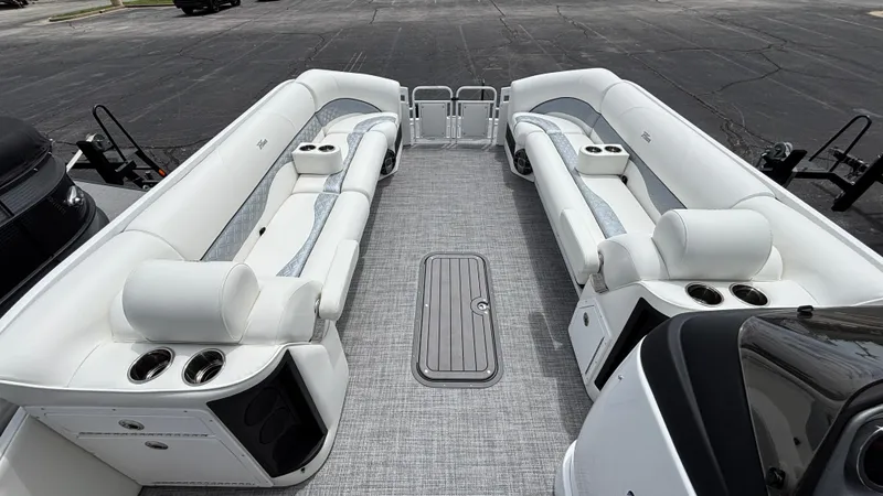 Slide: The Image of 2025 JC Sporttoon 27TT pontoon boat interior with spacious seating and modern design. - 13