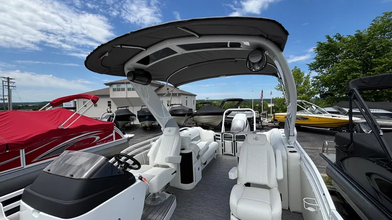 Slide: The Image of 2025 JC Sporttoon 27TT pontoon boat with sleek design and spacious seating. - 17