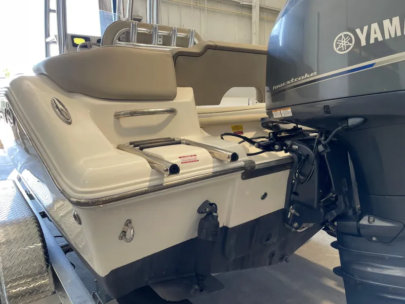 Slide: The Image of 2023 Key West 203 FS boat with Yamaha engine, named "ALOTALUCK II," on a trailer. - 12