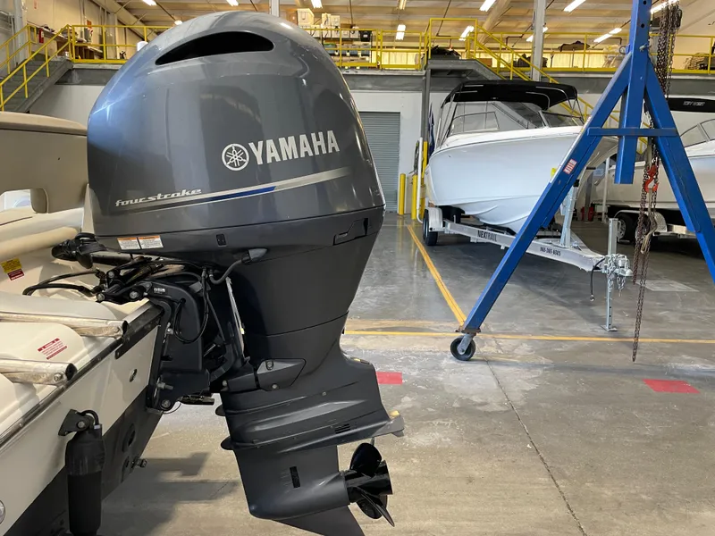 Slide: The Image of Propeller of 2023 Key West 203 FS boat on a trailer. - 15