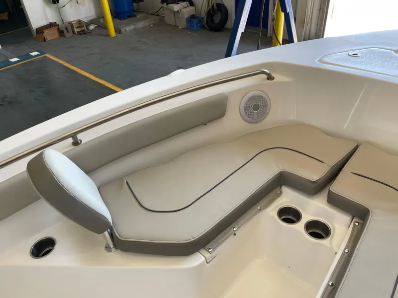 Slide: The Image of 2023 Key West 203 FS boat interior with seating and speakers. - 21