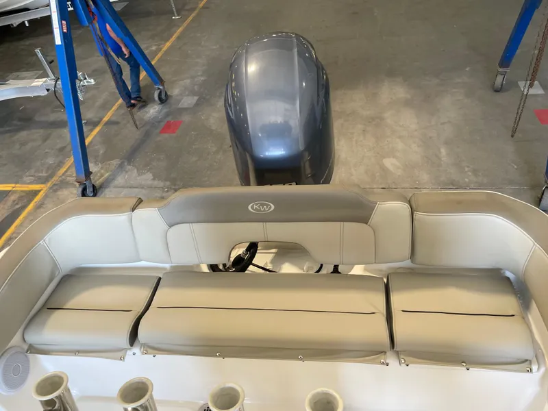 Slide: The Image of 2023 Key West 203 FS boat interior with rod holders and steering console. - 34