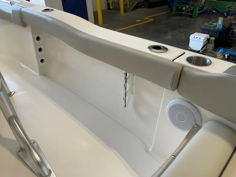 Slide: The Image of 2023 Key West 203 FS boat interior with cup holders and speaker. - 37