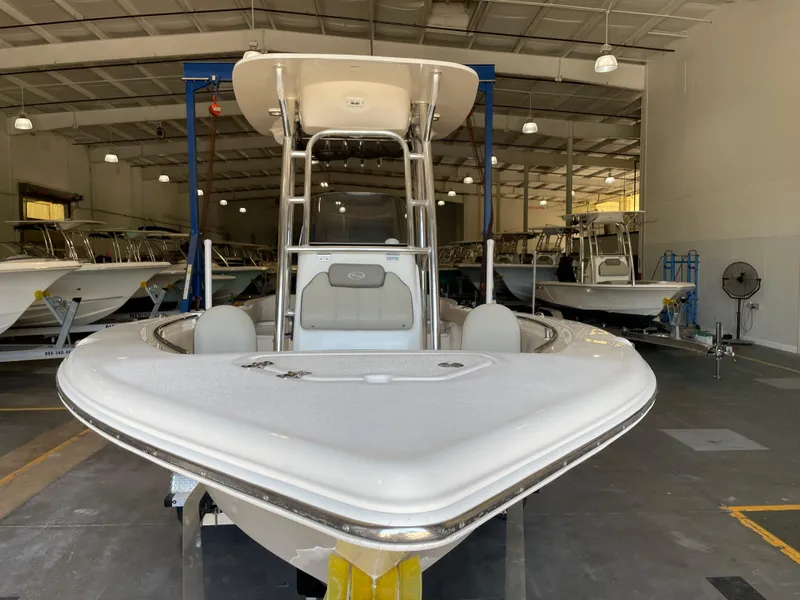 Slide: The Image of 2023 Key West 203 FS boat in storage facility, front view. - 7