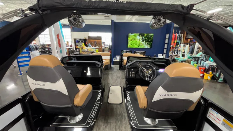 Slide: The Image of Interior of 2025 Viaggio Diamante D24UW A-T boat with dual captain chairs. - 13
