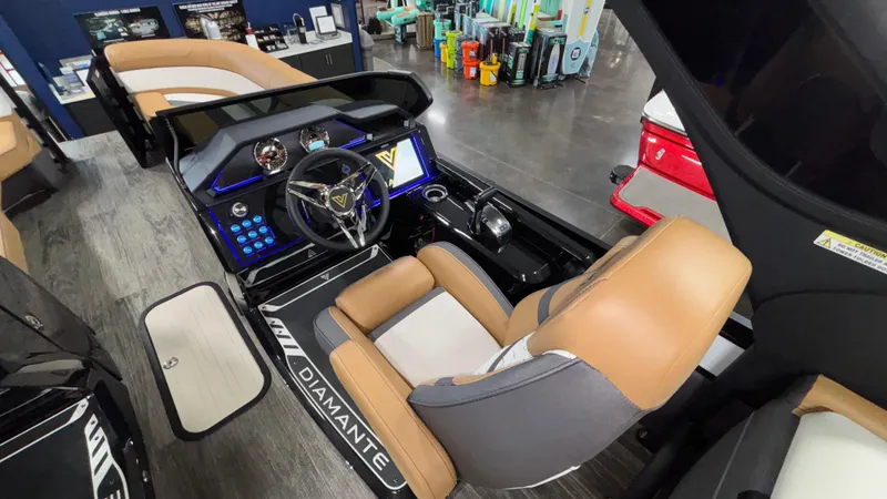 Slide: The Image of 2025 Viaggio Diamante D24UW A-T boat interior with modern dashboard and luxurious seating. - 16