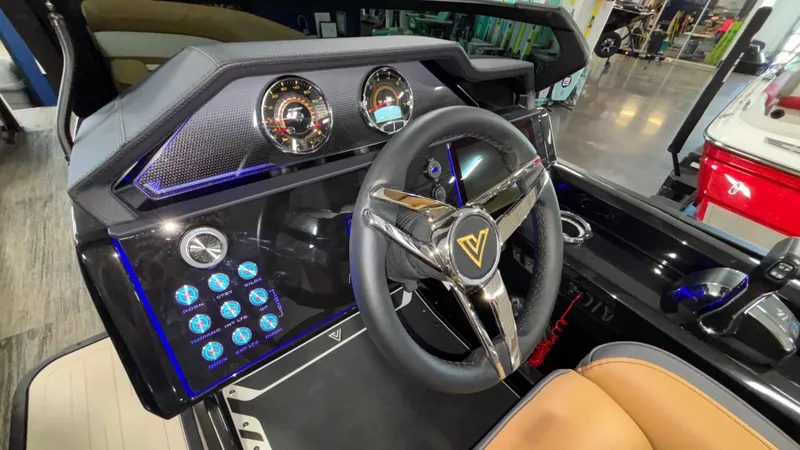 Slide: The Image of 2025 Viaggio Diamante D24UW A-T dashboard with modern steering wheel and illuminated controls. - 19