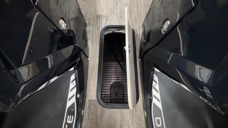 Slide: The Image of Viaggio Diamante D24UW A-T 2025 boat storage compartment with open hatch on sleek flooring. - 24