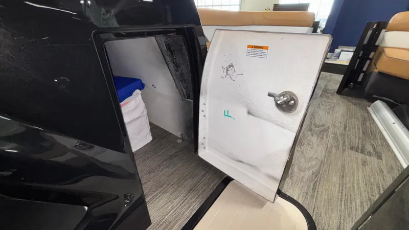 Slide: The Image of Open storage compartment in 2025 Viaggio Diamante D24UW A-T boat interior. - 25