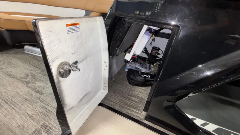 Slide: The Image of Open storage compartment in 2025 Viaggio Diamante D24UW A-T boat interior. - 26