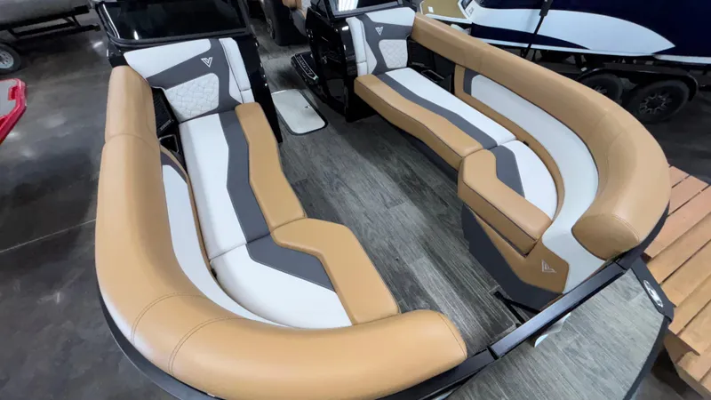Slide: The Image of Luxurious seating in 2025 Viaggio Diamante D24UW A-T boat, featuring tan and gray upholstery. - 29