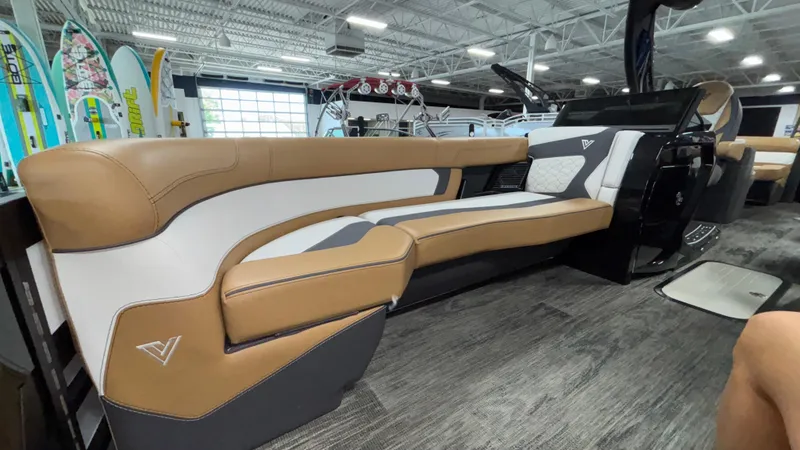 Slide: The Image of Luxurious interior of 2025 Viaggio Diamante D24UW A-T boat with tan and white seating. - 31