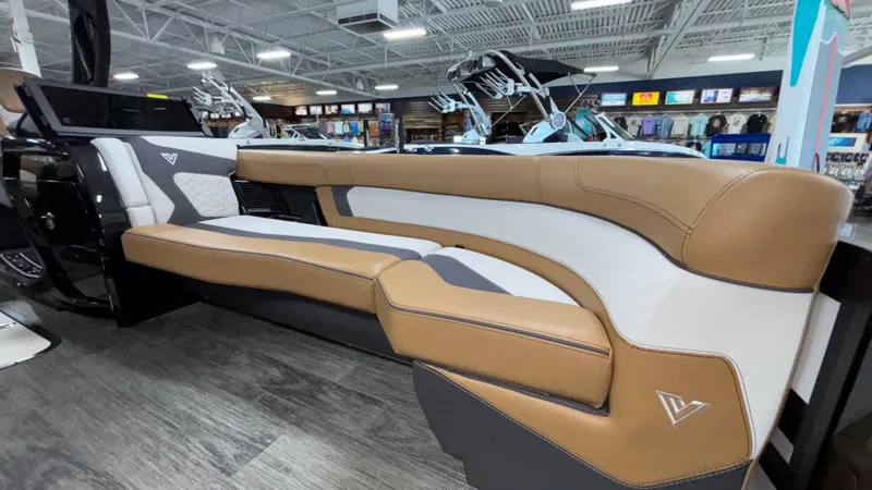 Slide: The Image of Luxurious interior of 2025 Viaggio Diamante D24UW A-T boat with tan and white seating. - 32