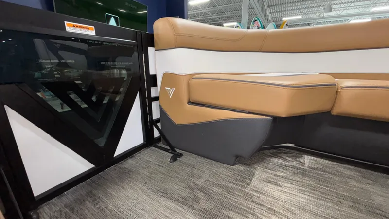 Slide: The Image of Luxurious Viaggio Diamante D24UW A-T 2025 boat interior with tan and white seating. - 37