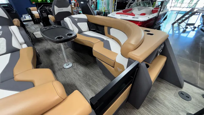 Slide: The Image of Luxurious Viaggio Diamante D24UW A-T 2025 boat interior with plush seating and table. - 6