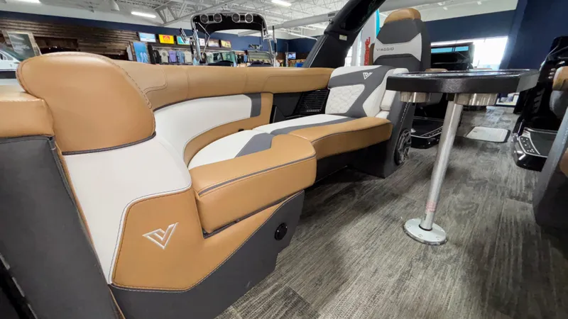 Slide: The Image of Luxurious interior of 2025 Viaggio Diamante D24UW A-T boat with tan and white seating. - 9