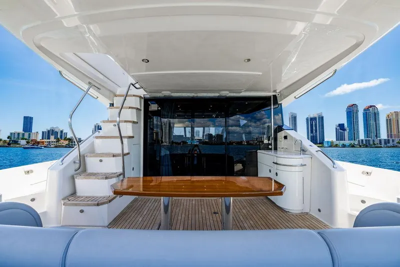 Slide: The Image of Luxurious 2016 Sea Ray L650 Fly yacht interior with city skyline view. - 21
