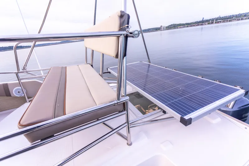 Slide: The Image of 2021 Cutwater C-32 CB boat with solar panel and seating, on calm water. - 43