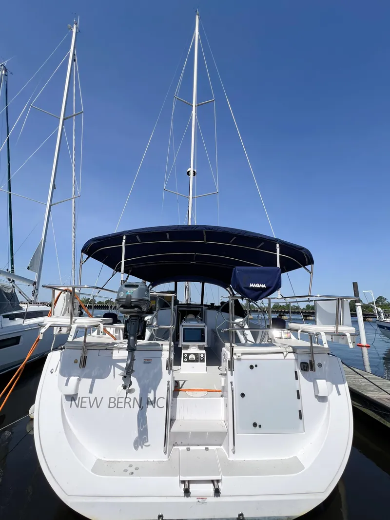 The Image of 2019 Catalina 425 sailboat docked, rear view with blue canopy, New Bern, NC. - 1
