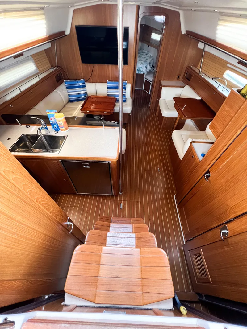 Slide: The Image of Interior of 2019 Catalina 425 yacht with wooden flooring and modern amenities. - 12