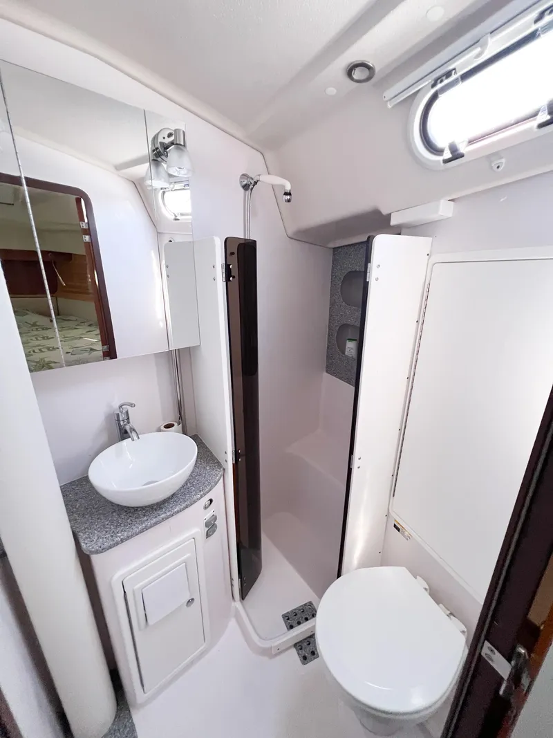Slide: The Image of 2019 Catalina 425 yacht bathroom with sink, toilet, and shower. - 15