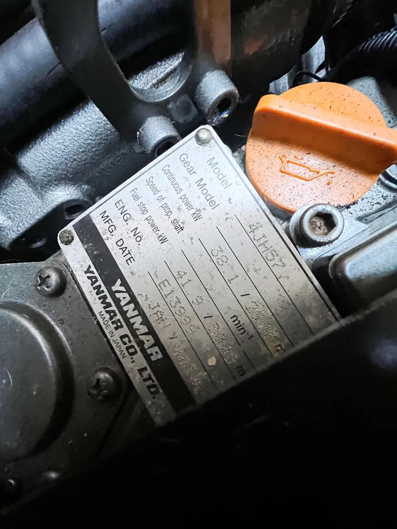 Slide: The Image of Close-up of a Yanmar engine label on a 2019 Catalina 425 sailboat. - 31
