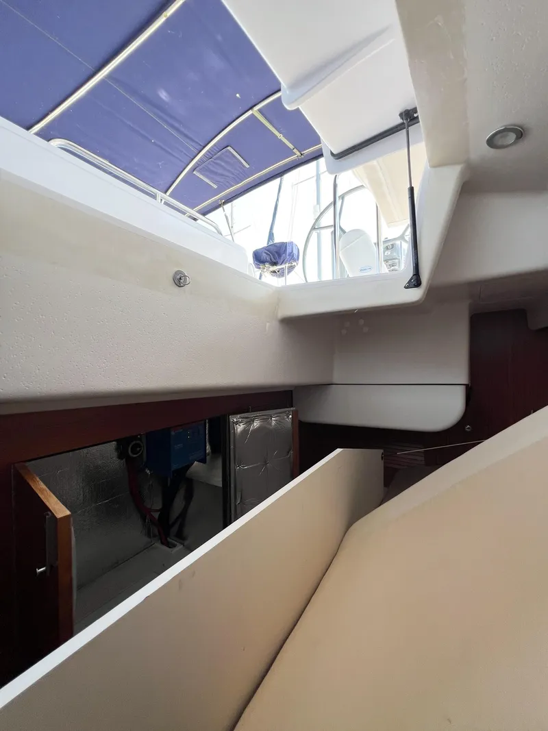 Slide: The Image of Interior view of 2019 Catalina 425 sailboat with modern design and blue canopy. - 35
