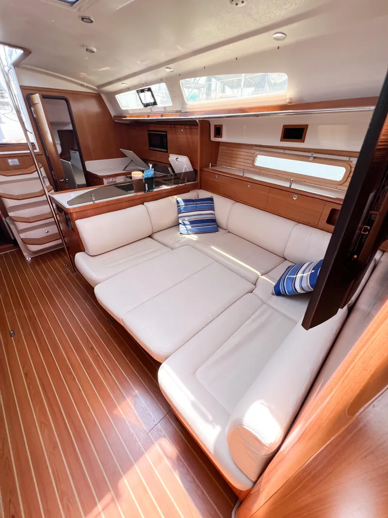 Slide: The Image of Spacious interior of 2019 Catalina 425 yacht with elegant wood finish and comfortable seating. - 42