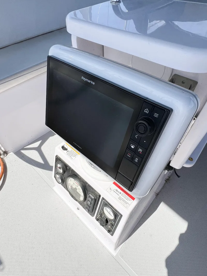 Slide: The Image of 2019 Catalina 425 yacht navigation system with Raymarine display and control panel. - 6