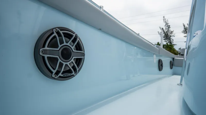 Slide: The Image of 2024 Contender 24 Sport boat with sleek speakers on the interior side panel. - 42