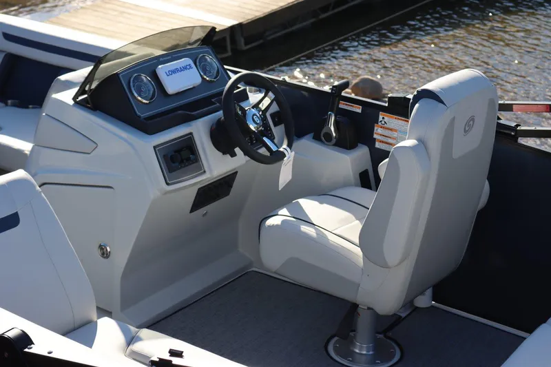Slide: The Image of 2024 Hurricane FD 1960RE3 OB boat interior with steering console and seating. - 4
