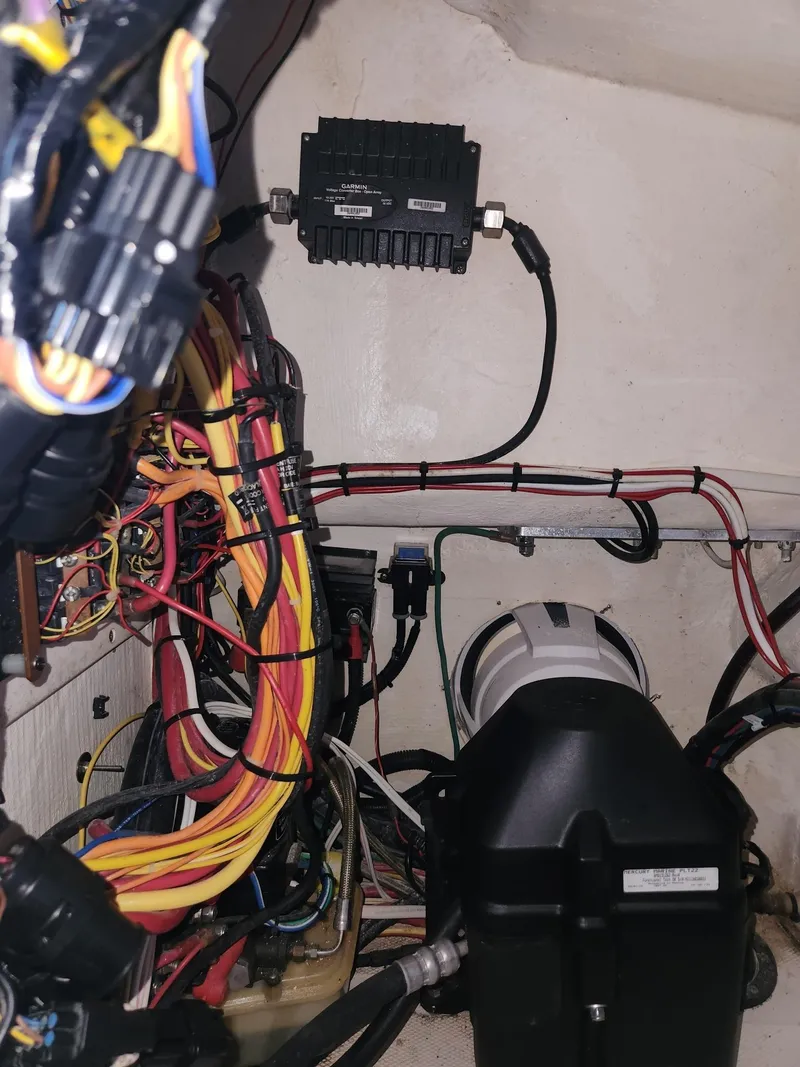 Slide: The Image of Wiring and components inside a 2013 Invincible 36 Open Fisherman boat. - 16