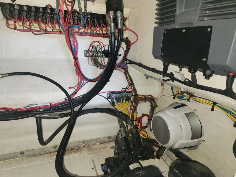 Slide: The Image of Electrical wiring and components inside a 2013 Invincible 36 Open Fisherman boat. - 26