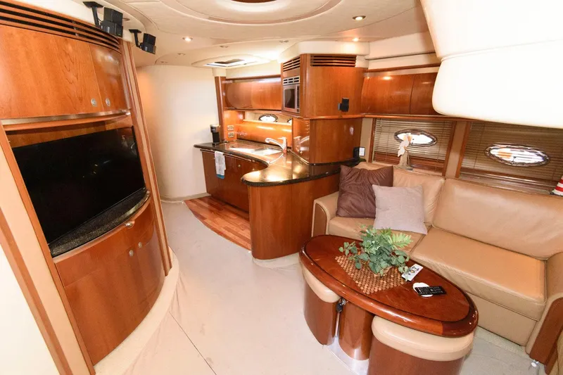 Slide: The Image of Luxurious interior of 2006 Sea Ray 52 Sundancer yacht with elegant wood finishes. - 22