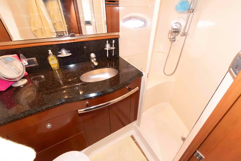 Slide: The Image of Luxurious bathroom in 2006 Sea Ray 52 Sundancer yacht with sleek fixtures and modern design. - 28
