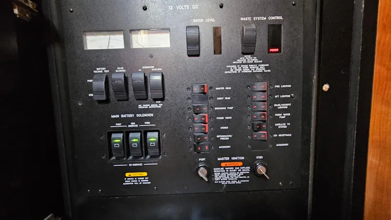 Slide: The Image of Electrical control panel on a 2005 Sea Ray 390 Sundancer boat. - 31