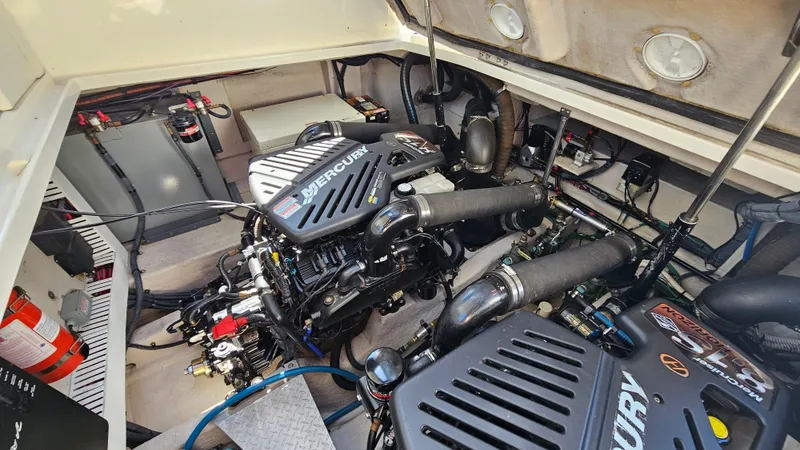 Slide: The Image of Engine room of a 2005 Sea Ray 390 Sundancer with Mercury engines. - 40