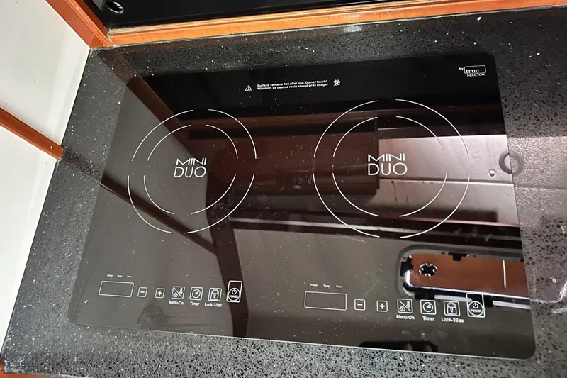 Slide: The Image of Induction cooktop on 2006 Hanse 461 yacht kitchen counter. - 19