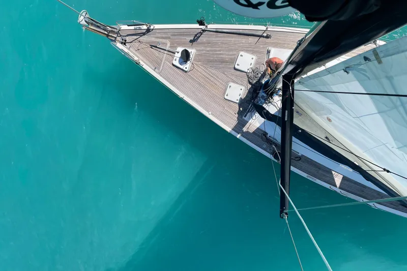 Slide: The Image of Aerial view of 2006 Hanse 461 sailboat on turquoise water. - 3