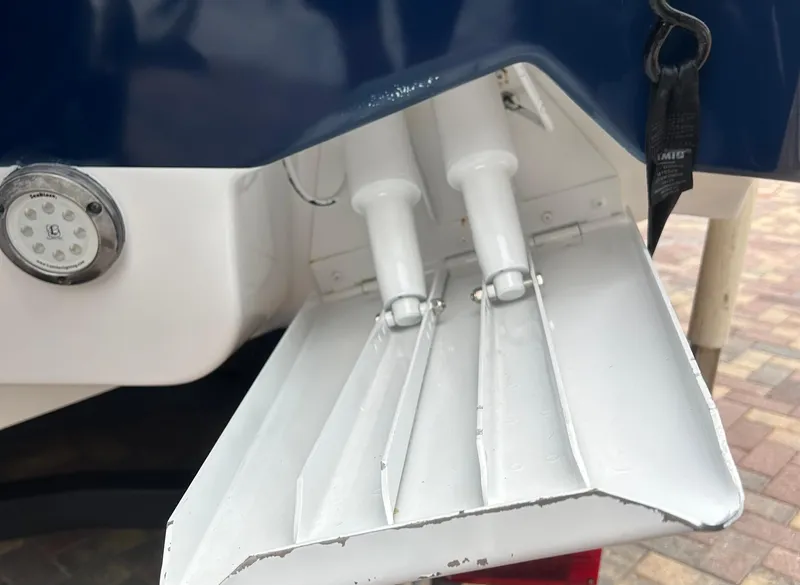 Slide: The Image of 2006 Hydra-Sports Vector 2900 CC trim tabs and hydraulic system close-up. - 24