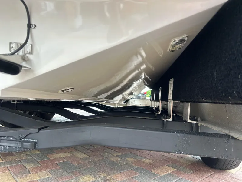 Slide: The Image of 2006 Hydra-Sports Vector 2900 CC boat hull on trailer, showcasing underside details. - 32