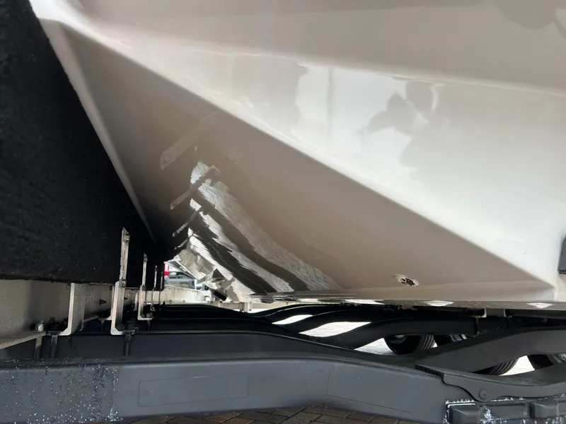 Slide: The Image of 2006 Hydra-Sports Vector 2900 CC boat hull on trailer, showcasing sleek design and structure. - 33