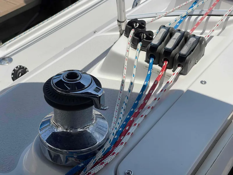 Slide: The Image of Sailboat deck with winch and colorful ropes, Hunter 309, 2006 model. - 16