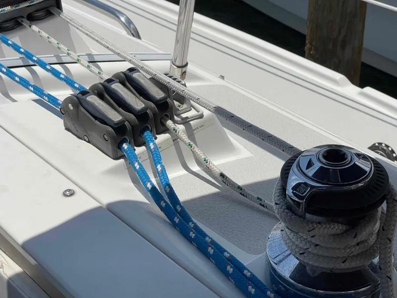 Slide: The Image of Sailboat deck with ropes and winch, Hunter 309, 2006 model. - 17