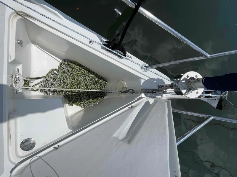 Slide: The Image of Anchor locker of a 2006 Hunter 309 sailboat with coiled rope. - 47