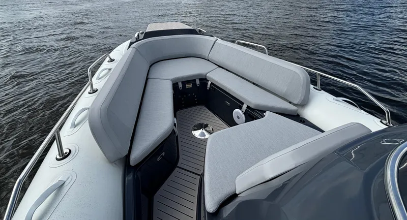 Slide: The Image of 2024 Zodiac Medline 9 boat with spacious seating on calm water. - 4
