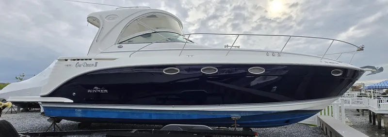 Slide: The Image of 2008 Rinker 400 Express Cruiser boat on display, featuring sleek design and modern amenities. - 25