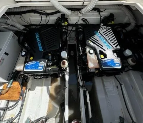 Slide: The Image of Engine compartment of a 2008 Rinker 400 Express Cruiser with twin Seacore engines. - 47